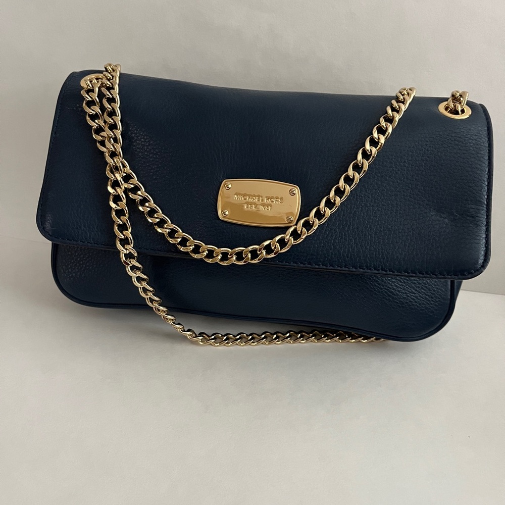 Blue and gold Michael Kors small bag. Gold single or double chain.